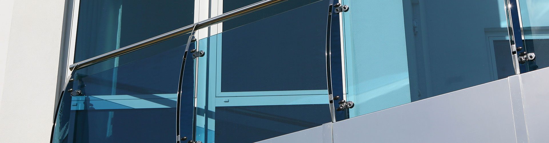 Blue glass balcony balustrade